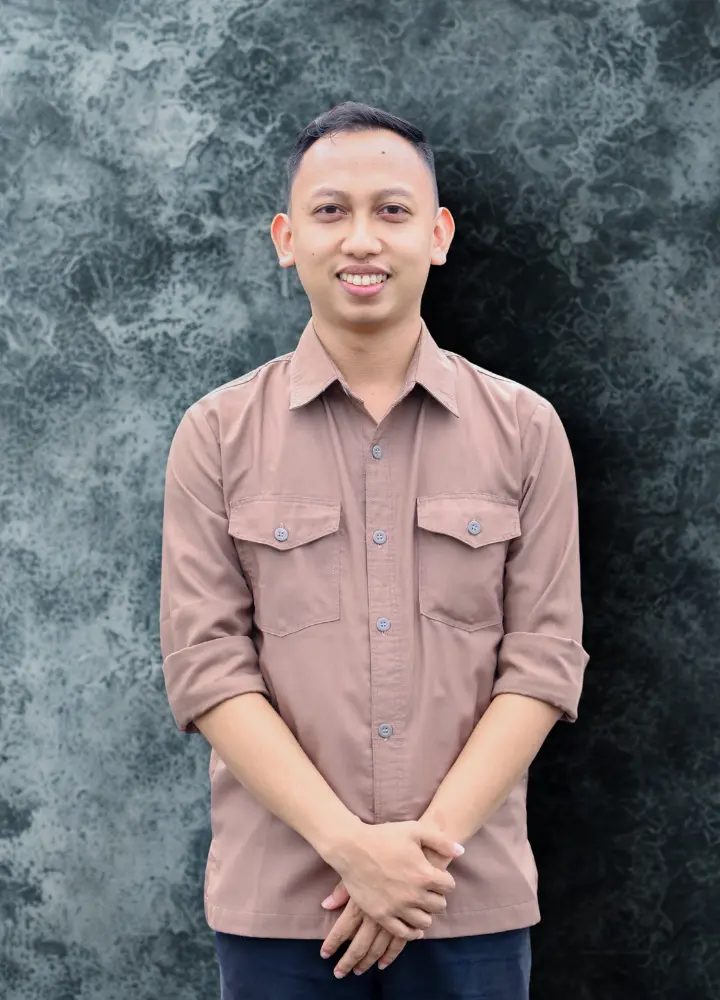 Ma`mun Nawawi, M.E.